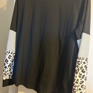 Elegant Black and White Long Sleeve Top with Patterned Sleeves